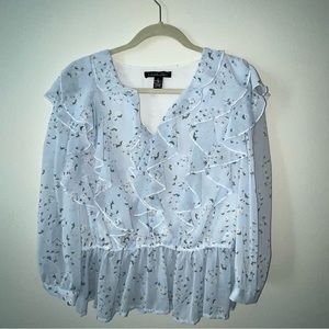 Blue floral ruffle top. 3/4 length sleeves. Brand is A love story.